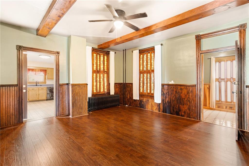 308 East Main Street Stoystown, PA 15563 - Photo 17 of 49 a view of an empty room with wooden floor and a window