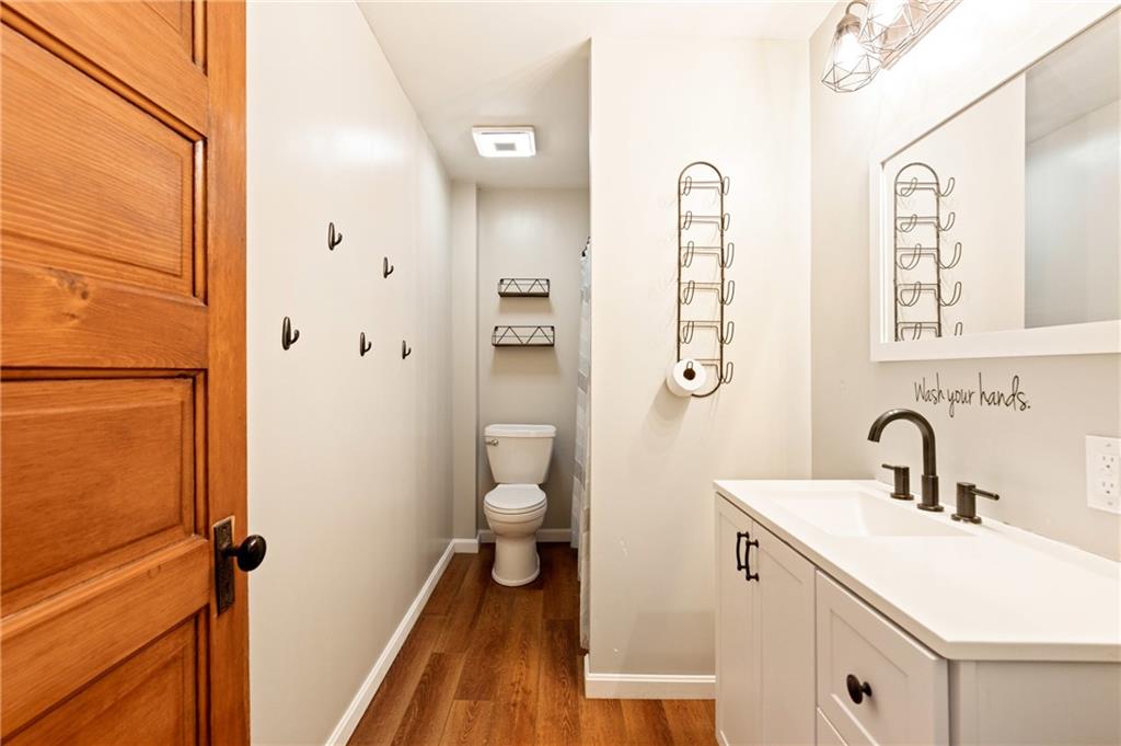 308 East Main Street Stoystown, PA 15563 - Photo 28 of 49 a bathroom with a sink a toilet and a mirror