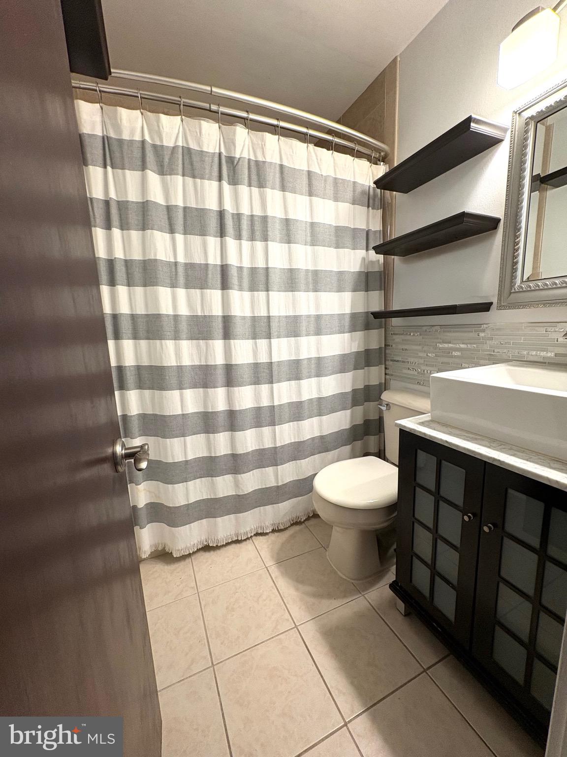 319 South Coles Avenue Maple Shade, NJ 08052 - Photo 13 of 23 a bathroom with a sink toilet and shower