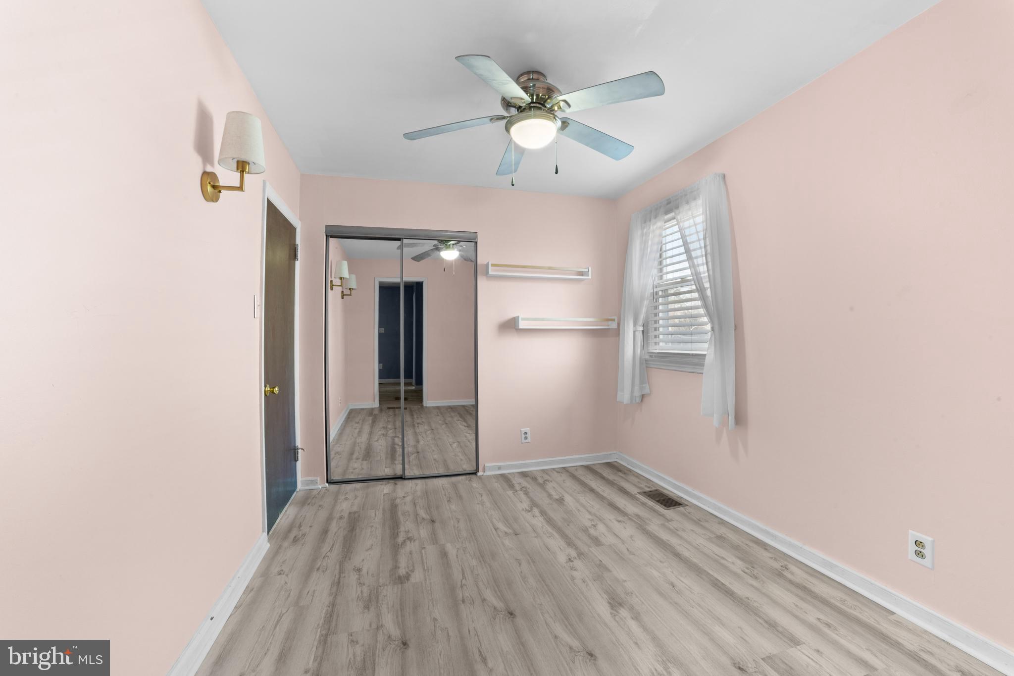319 South Coles Avenue Maple Shade, NJ 08052 - Photo 16 of 23 wooden floor in an empty room with a window