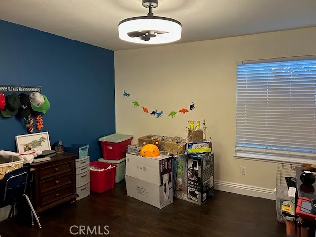 a bedroom with a bed and a table