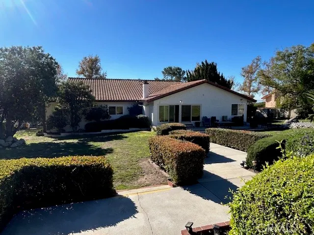 a view of a swimming pool with a lounge chair