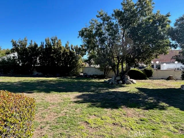 a view of swimming pool from a balcony