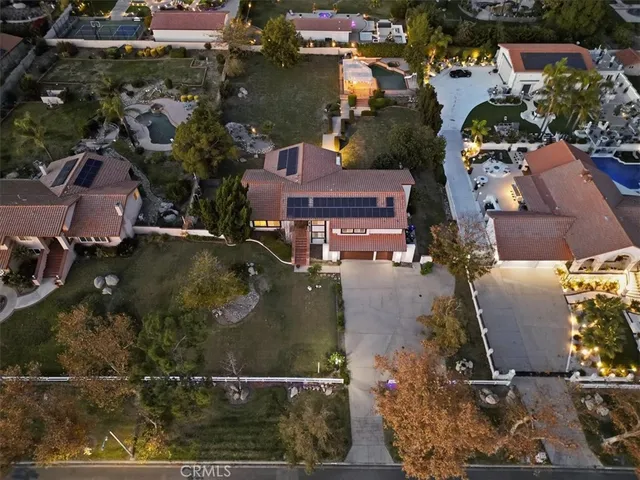a kitchen with stainless steel appliances kitchen island granite countertop a stove and cabinets