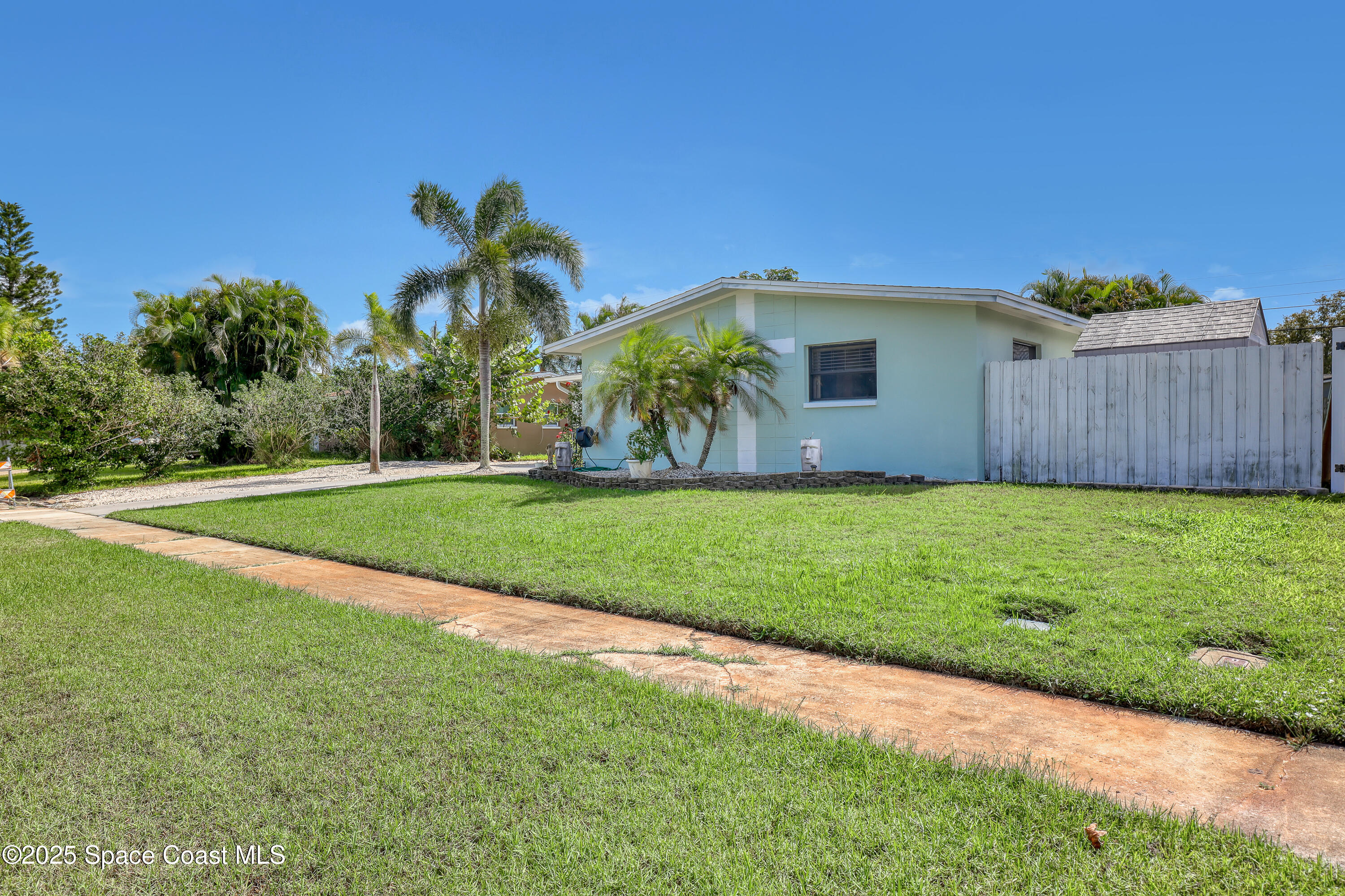 355 Aztec Avenue Merritt Island, FL 32952 - Photo 3 of 48 a view of a house with a backyard