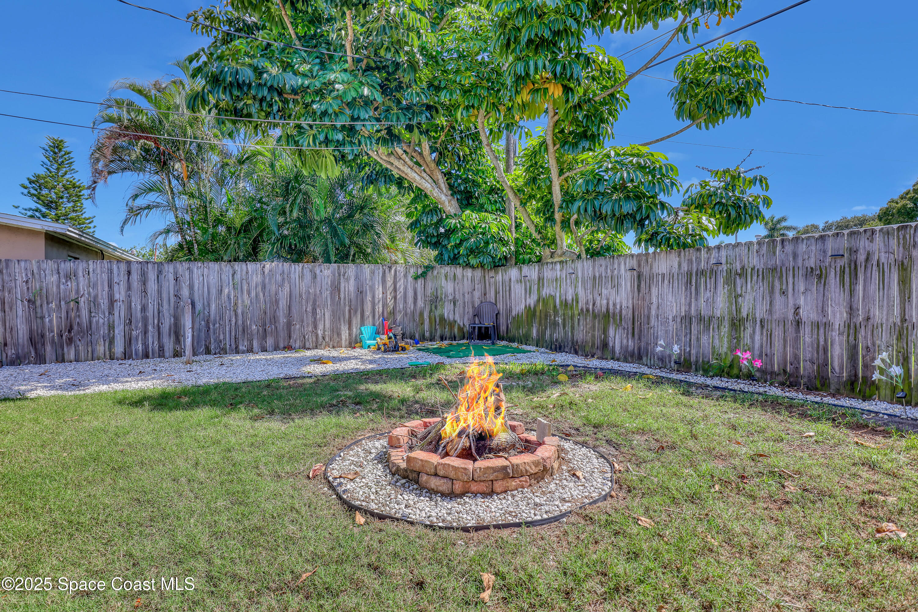 355 Aztec Avenue Merritt Island, FL 32952 - Photo 34 of 48 a backyard of a house