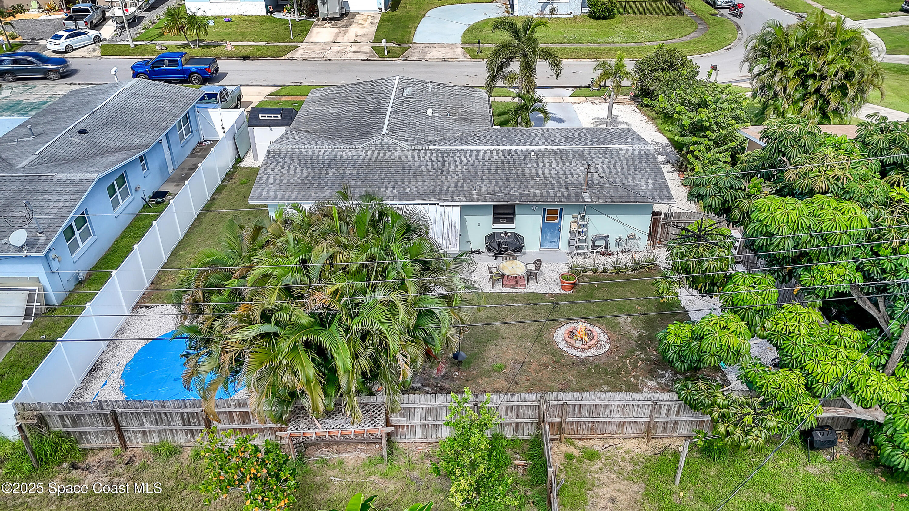 355 Aztec Avenue Merritt Island, FL 32952 - Photo 43 of 48 an aerial view of a house with garden space and street view