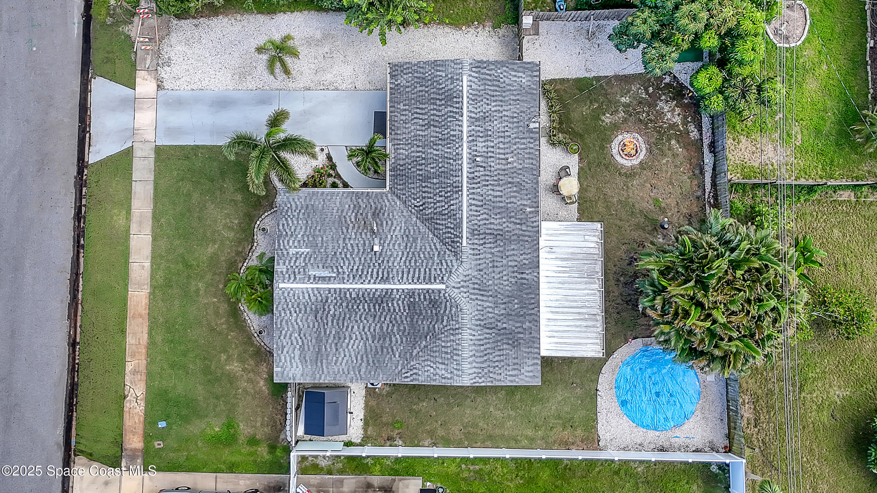 355 Aztec Avenue Merritt Island, FL 32952 - Photo 44 of 48 an aerial view of a house with yard swimming pool and outdoor seating
