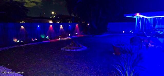 355 Aztec Avenue Merritt Island, FL 32952 - Photo 7 of 48 a view of a yard with red space and a yard