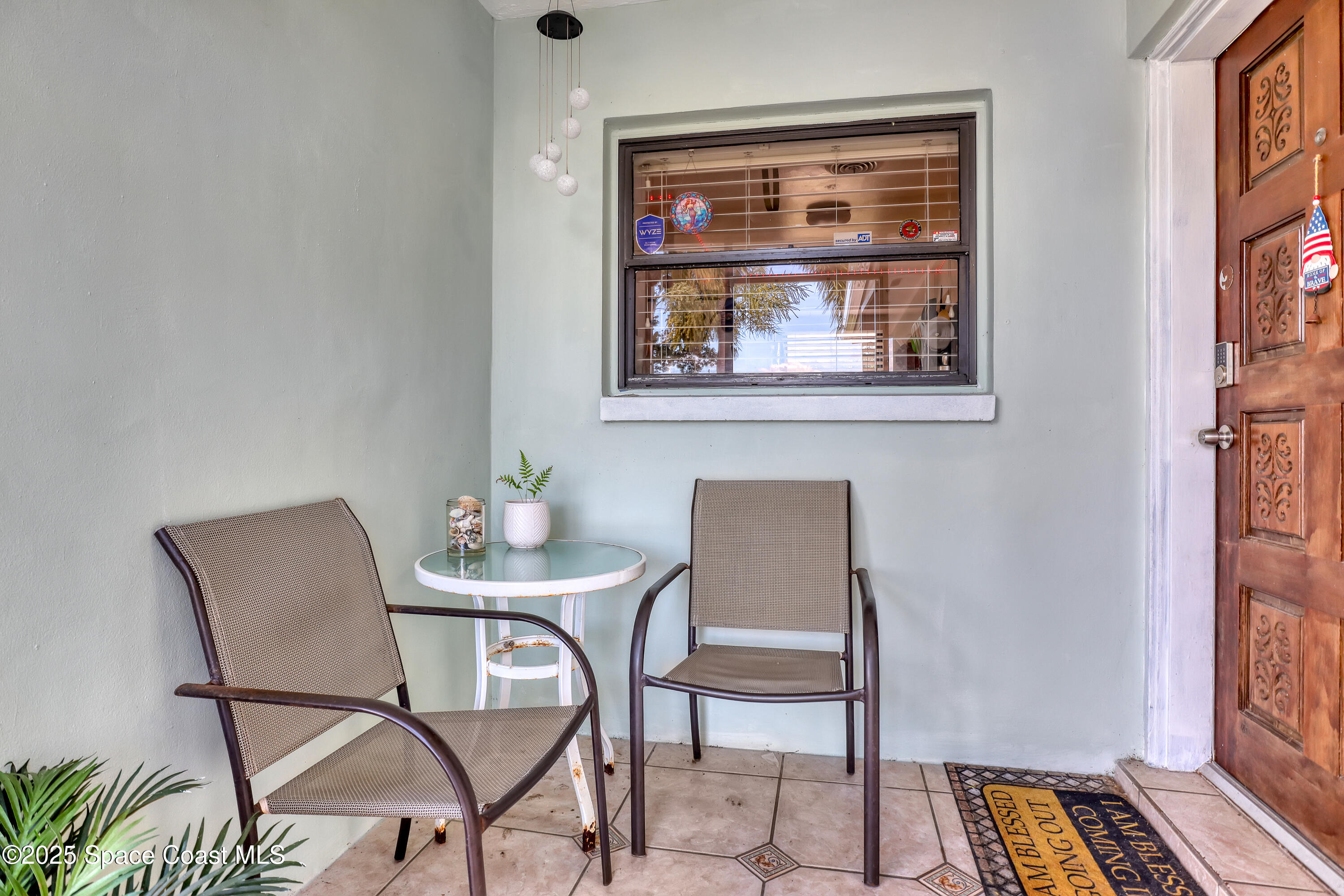 355 Aztec Avenue Merritt Island, FL 32952 - Photo 8 of 48 a dining room with furniture and window