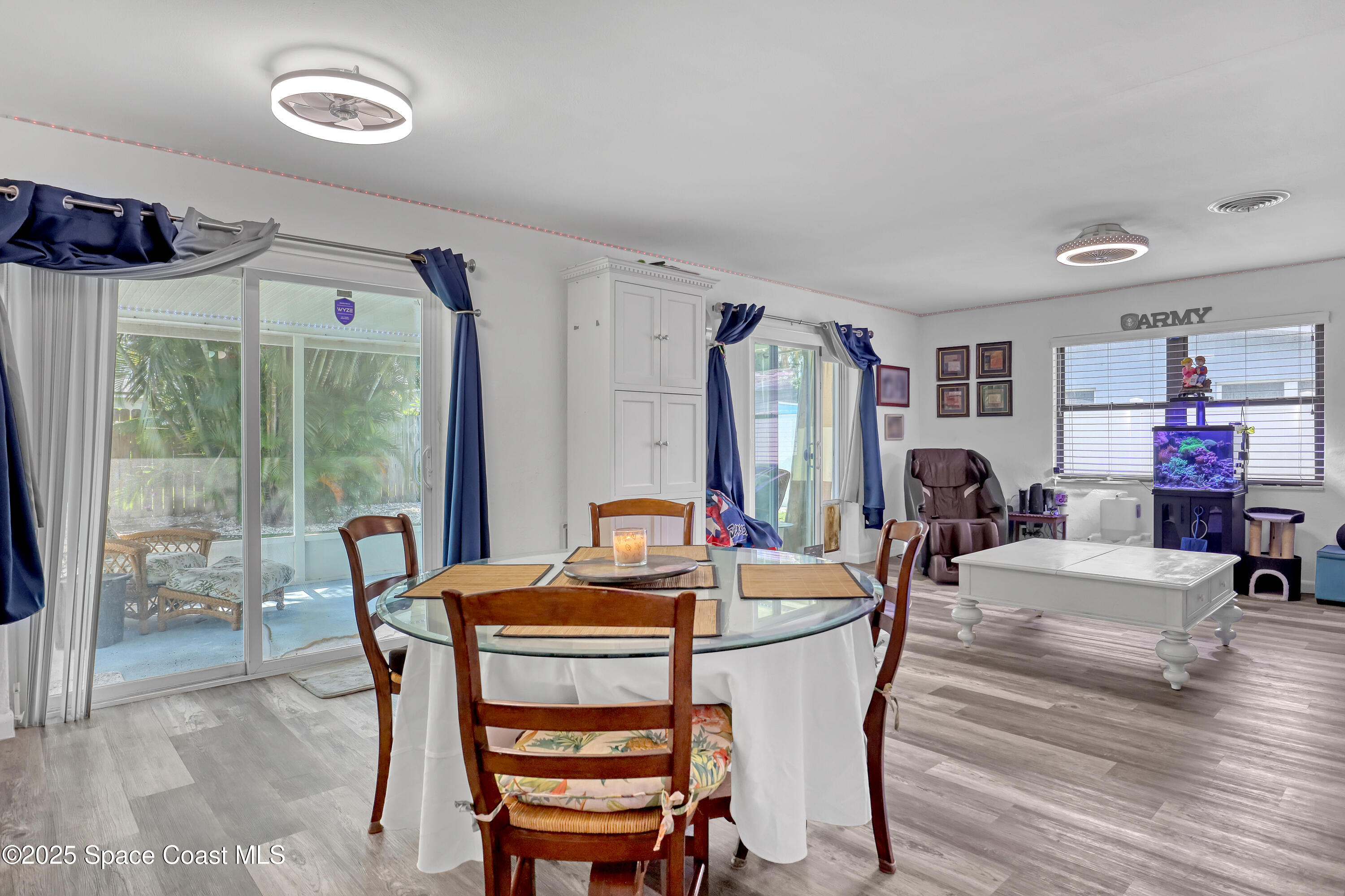 355 Aztec Avenue Merritt Island, FL 32952 - Photo 9 of 48 a dining room with furniture and window
