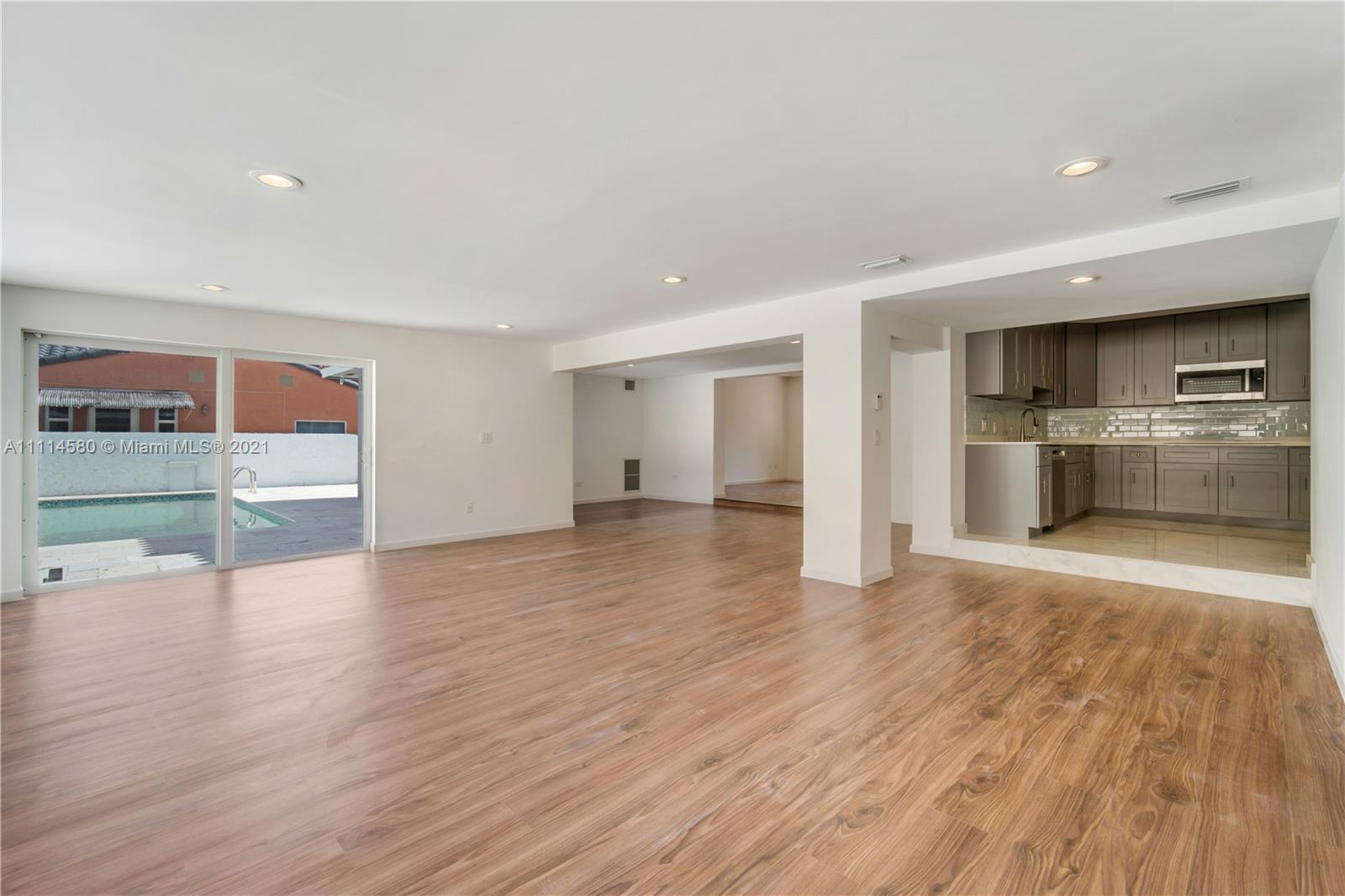 825 Southwest 28th Road Miami, FL 33129 - Photo 13 of 40 a view of empty room with wooden floor