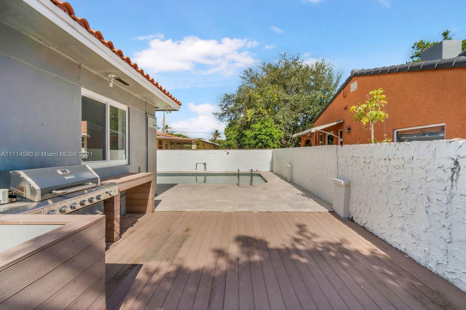 825 Southwest 28th Road Miami, FL 33129 - Photo 25 of 40 swimming pool view with a outdoor space