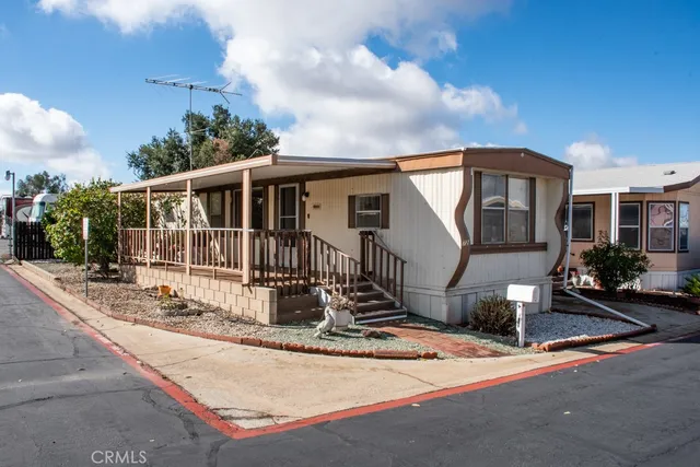 a front view of a house with street