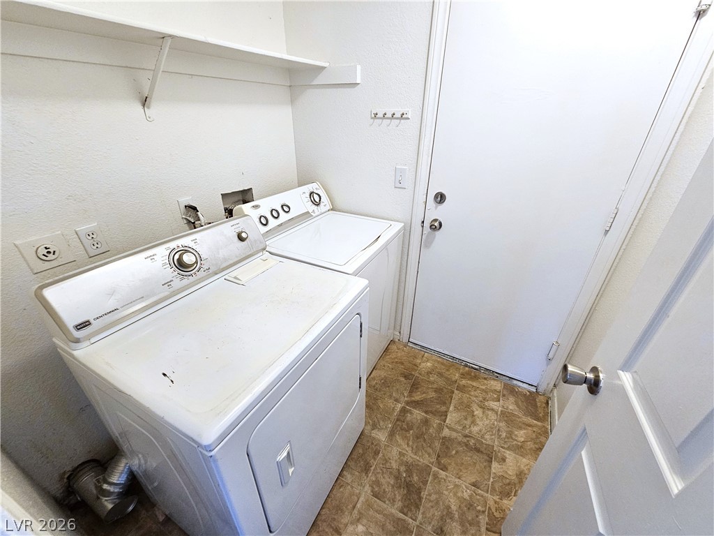 2817 Albemarle Way Henderson, NV 89014 - Photo 15 of 25 Functional utility space with practical appliances for everyday convenience.