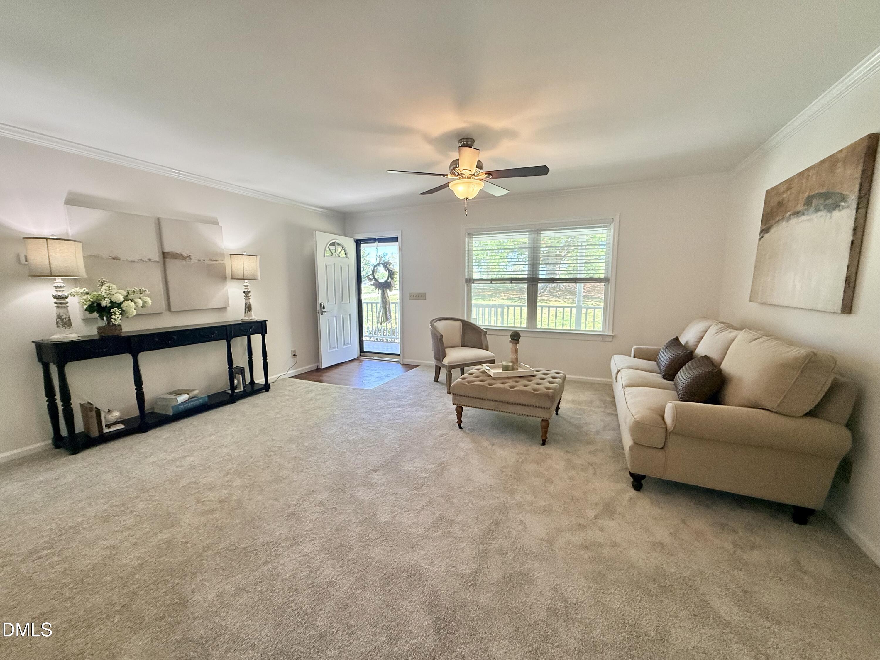 2429 Halifax Road Roxboro, NC 27573 - Photo 7 of 54 a living room with furniture and a window