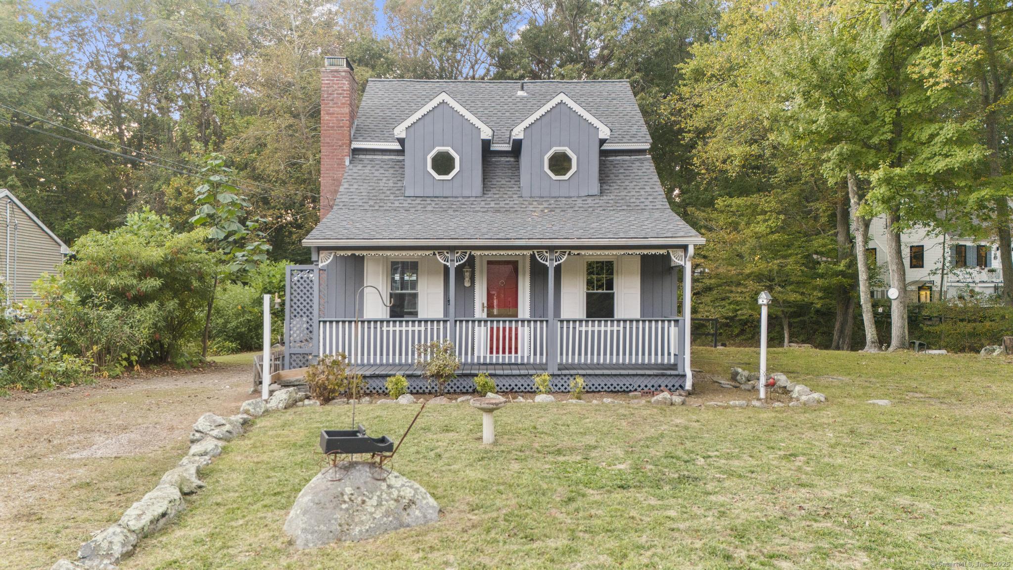 a house with trees in the background