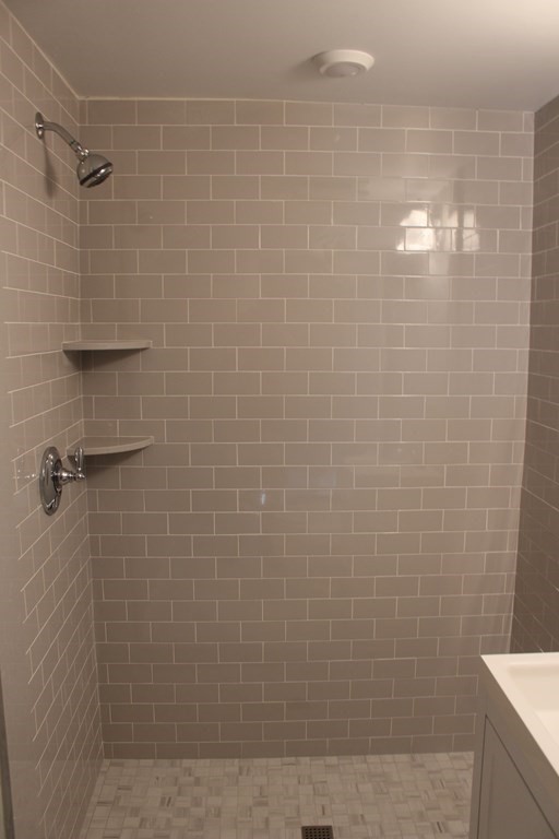 81 Alder Street Waltham, MA 02453 - Photo 15 of 38 a bathroom with a shower