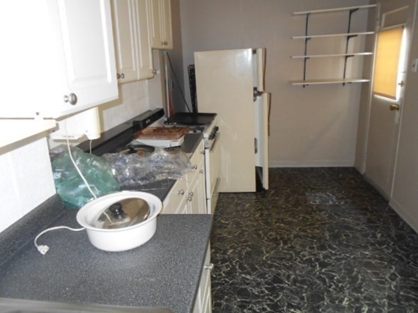 81 Alder Street Waltham, MA 02453 - Photo 24 of 38 a bathroom with a granite countertop sink and a mirror