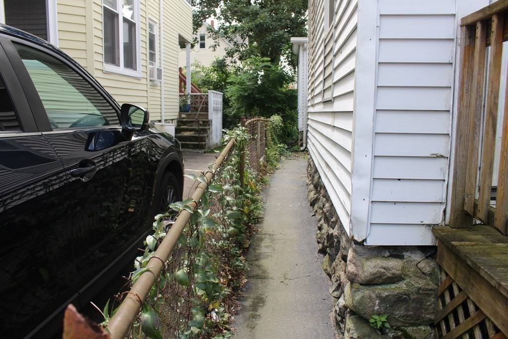 81 Alder Street Waltham, MA 02453 - Photo 28 of 38 a view of entryway with wooden floor