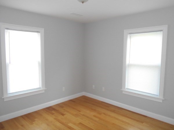 81 Alder Street Waltham, MA 02453 - Photo 8 of 38 an empty room with a window