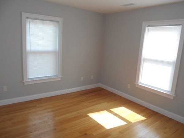 81 Alder Street Waltham, MA 02453 - Photo 9 of 38 an empty room with a window