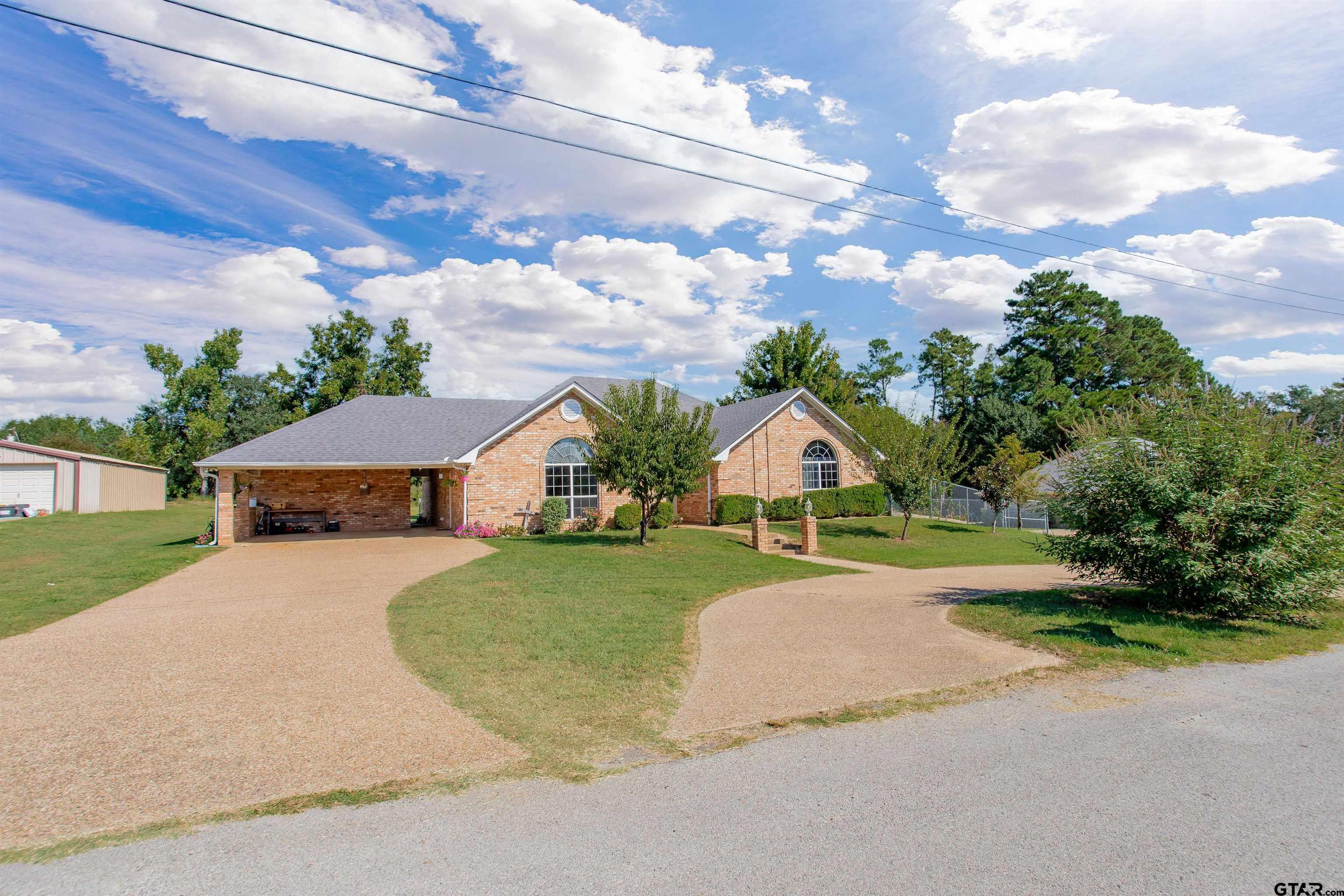 149 Pecan Street Frankston, TX 75763 - Photo 12 of 35 front view of a house with a yard