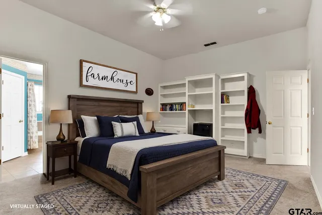 a spacious bathroom with a double vanity sink a large mirror a shower and a bathtub