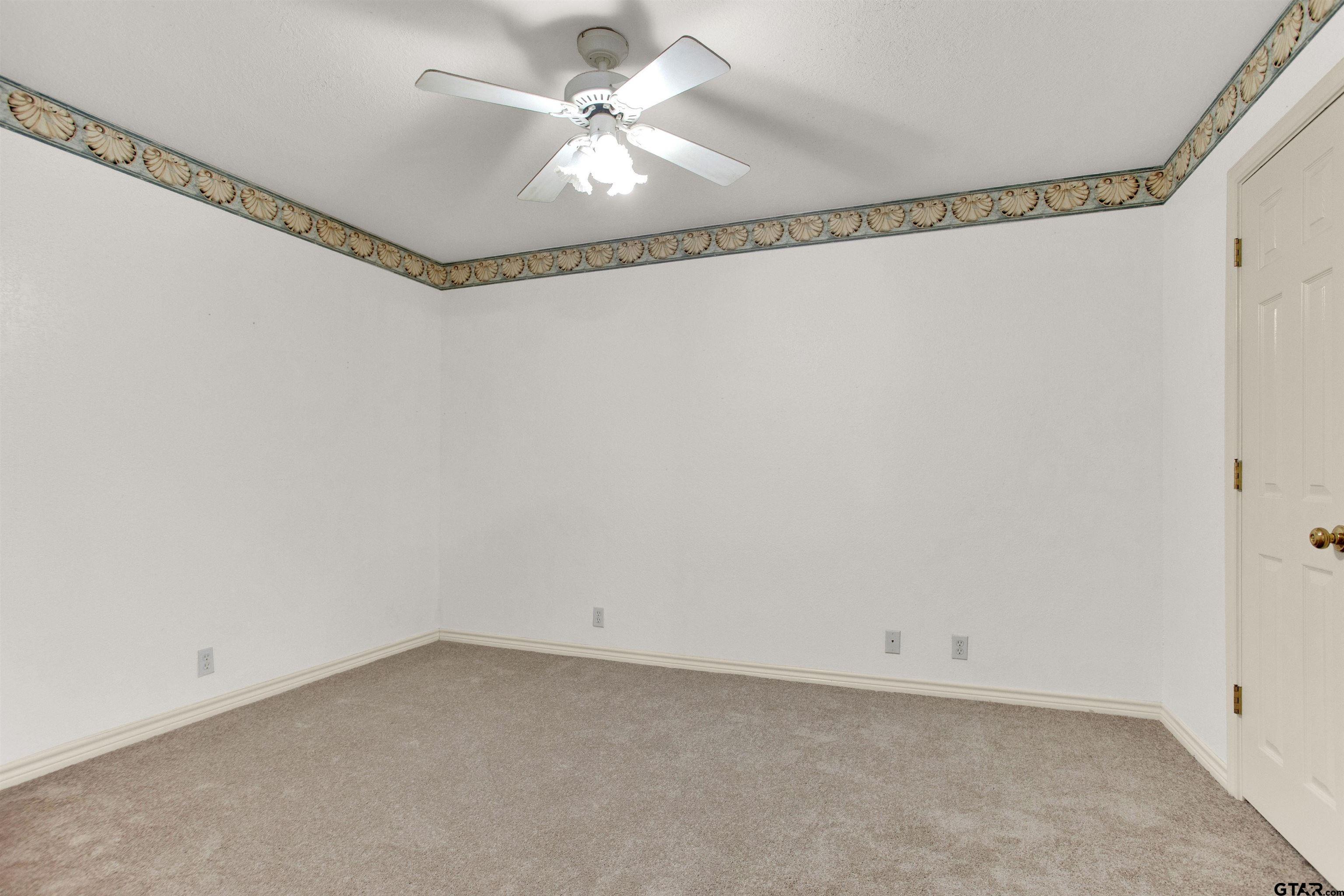 149 Pecan Street Frankston, TX 75763 - Photo 17 of 35 a view of a room with window and a ceiling fan
