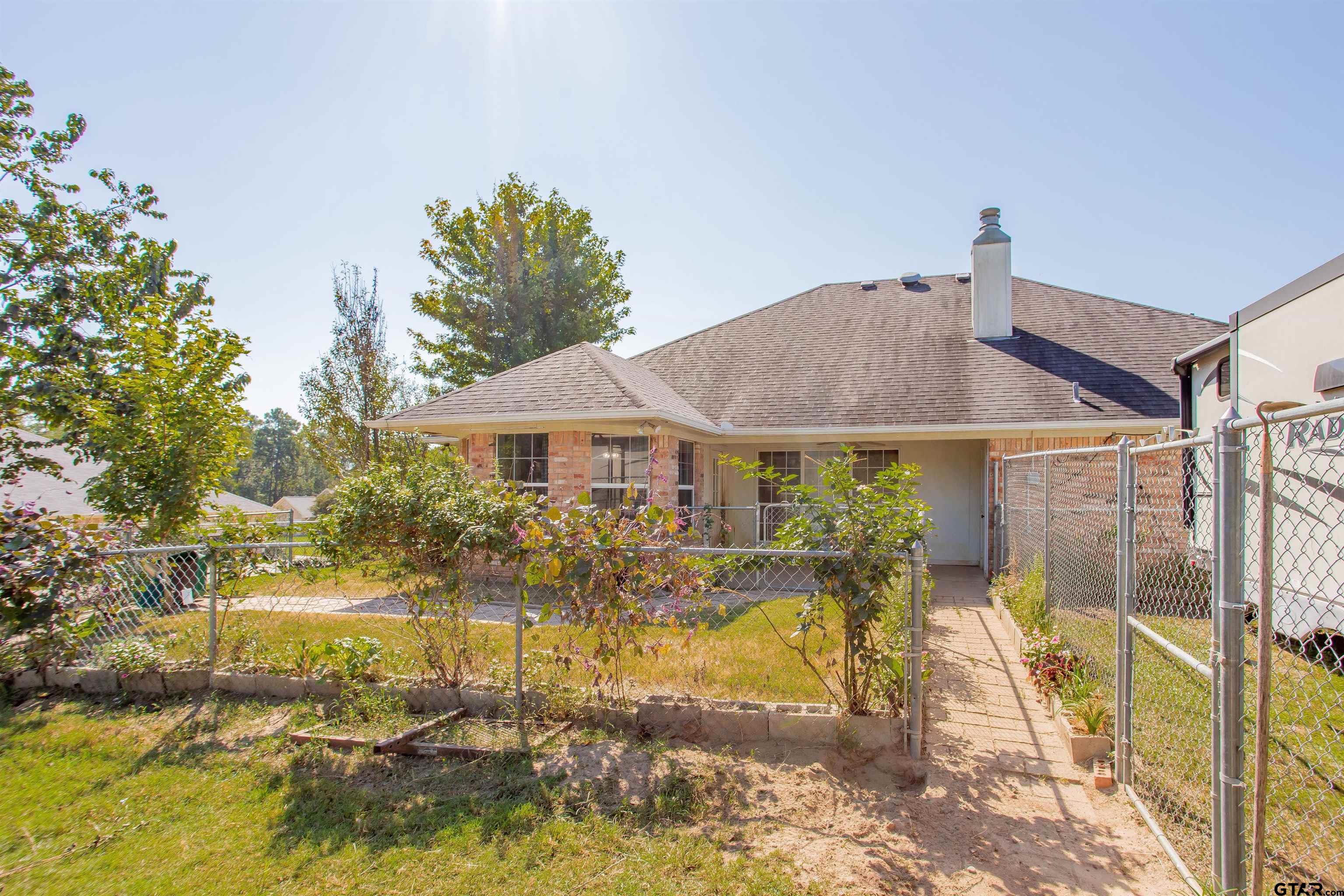 149 Pecan Street Frankston, TX 75763 - Photo 21 of 35 a front view of a house with a yard
