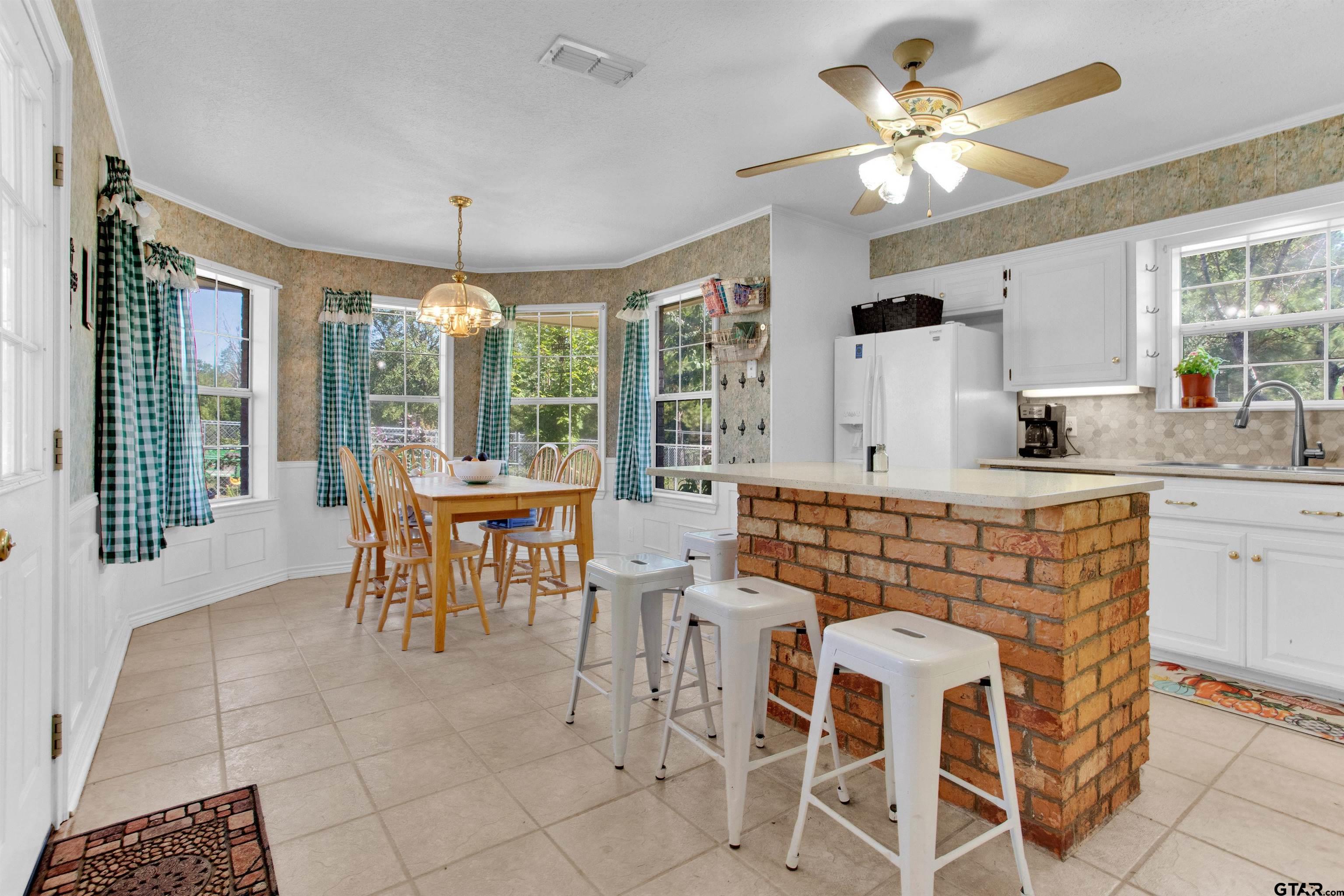 149 Pecan Street Frankston, TX 75763 - Photo 5 of 35 a view of a dining room with furniture window and outside view