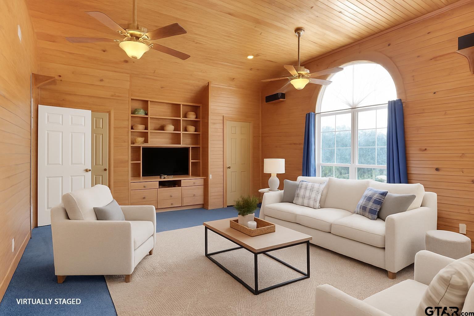 149 Pecan Street Frankston, TX 75763 - Photo 9 of 35 a living room with furniture a flat screen tv and a large window