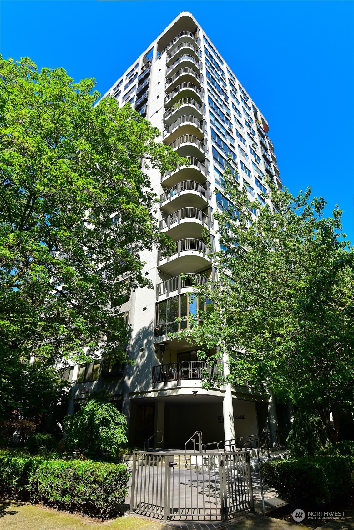 1120 Spring Street, Unit 1004 Seattle, WA 98104 - Photo 1 of 23 a view of balcony with table and chairs