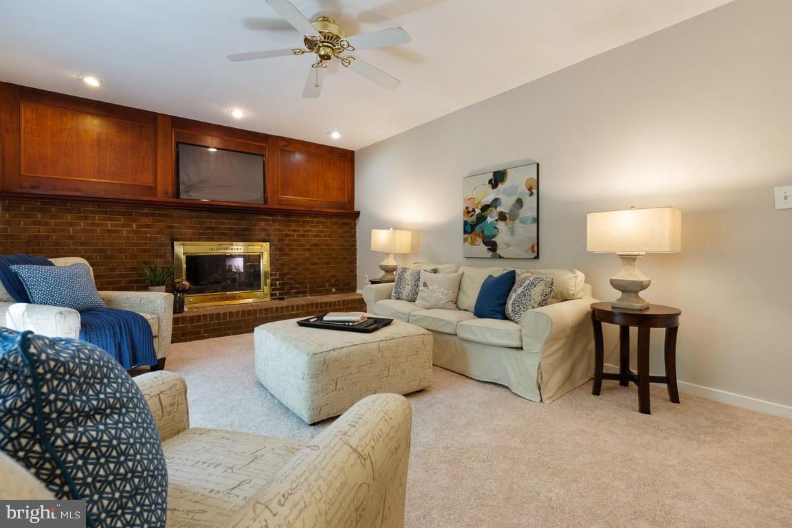 11715 Blue Smoke Trail Reston, VA 20191 - Photo 17 of 37 Custom wood mantle and wood burning fireplace