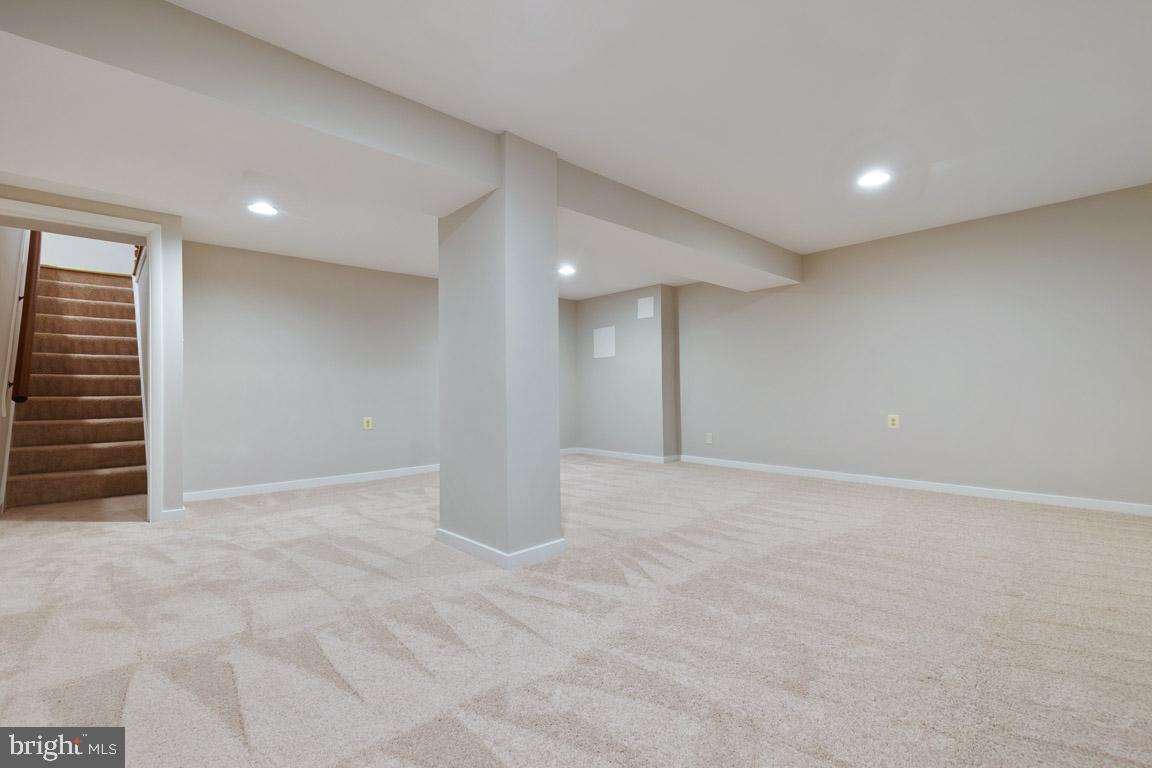 11715 Blue Smoke Trail Reston, VA 20191 - Photo 29 of 37 Finished lower level recreation room