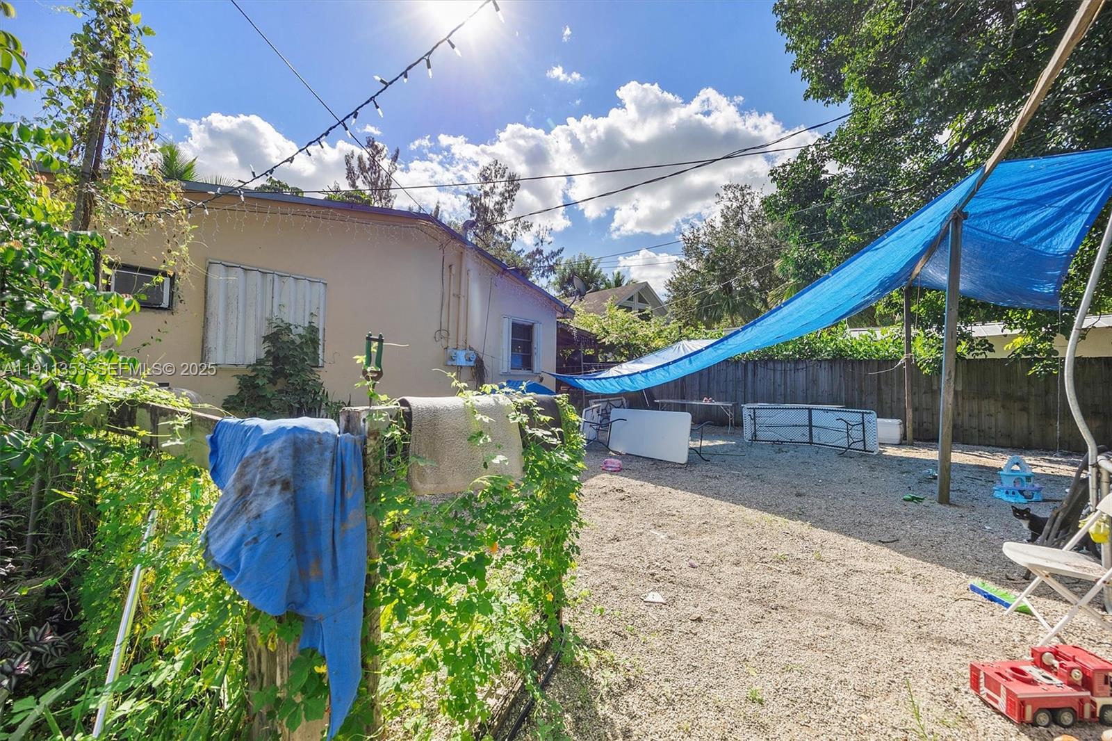 22950 Southwest 156th Avenue Miami, FL 33170 - Photo 6 of 11 a view of a backyard with a patio