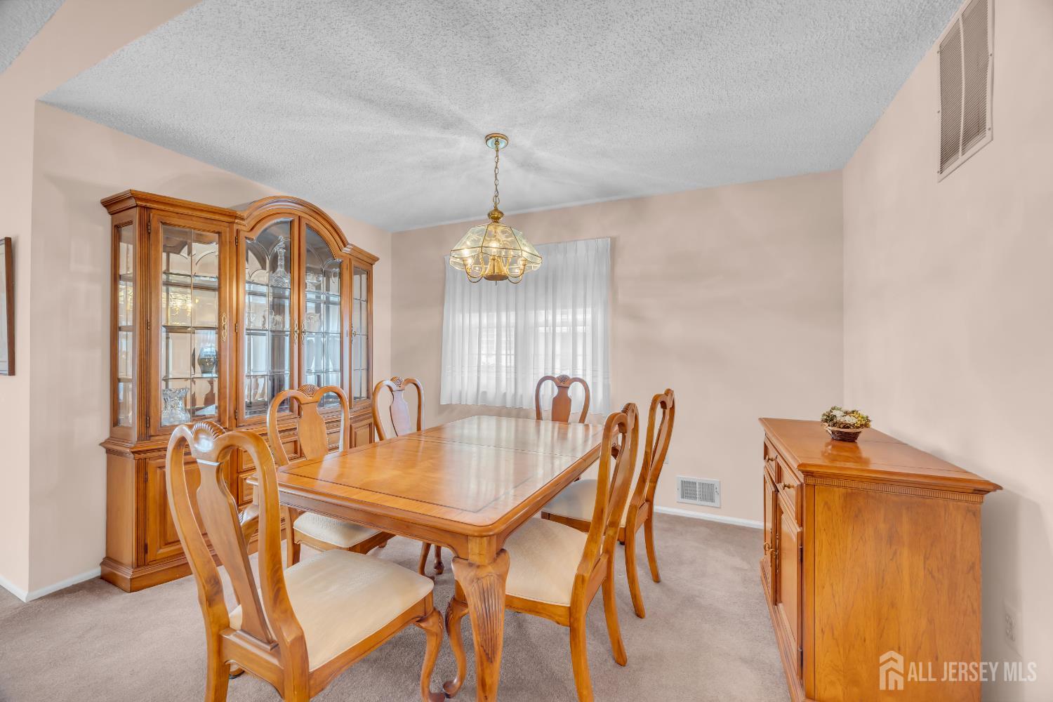 7 Gatley Close Freehold, NJ 07728 - Photo 11 of 36 a dining room with furniture and window