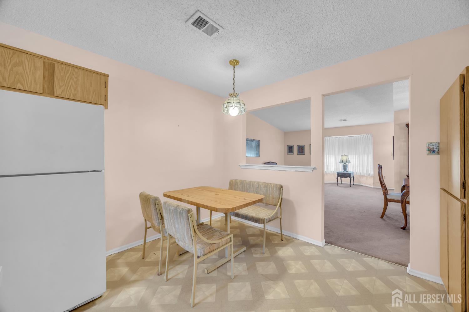 7 Gatley Close Freehold, NJ 07728 - Photo 12 of 36 a view of a dining room with furniture