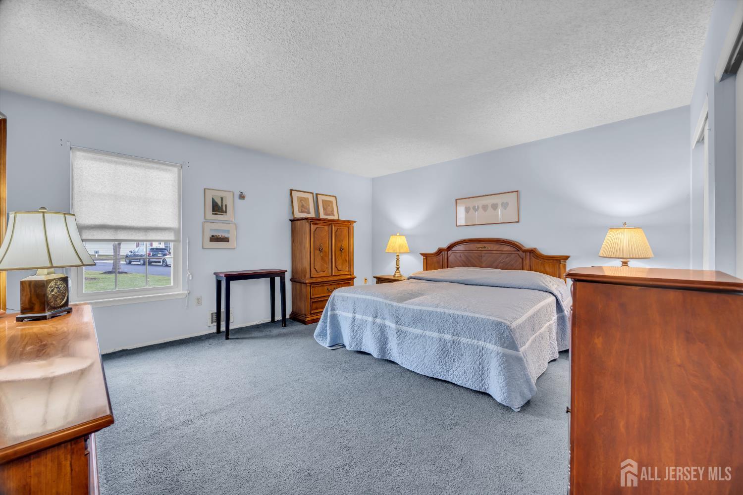 7 Gatley Close Freehold, NJ 07728 - Photo 22 of 36 a bedroom with a bed and a couch