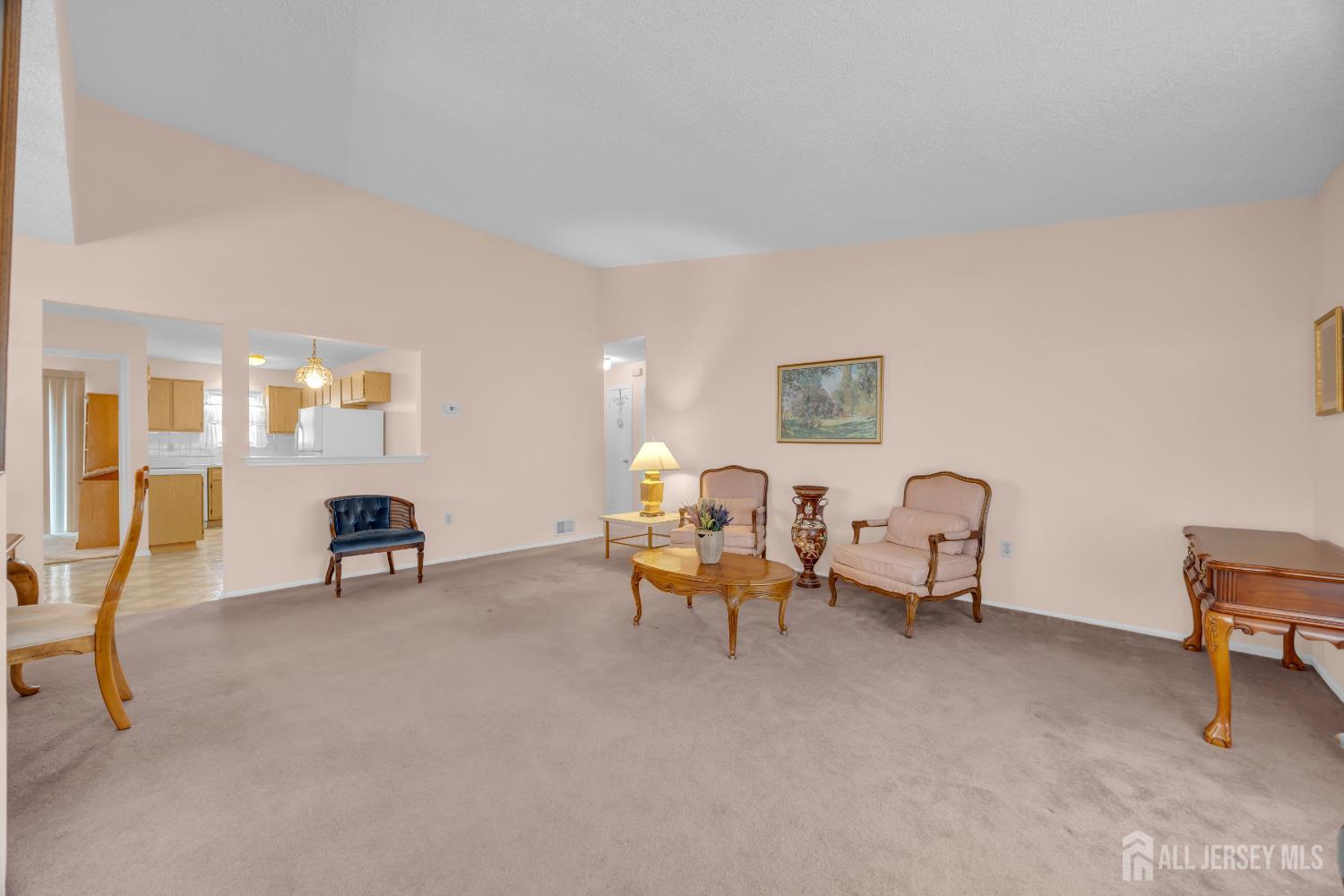 7 Gatley Close Freehold, NJ 07728 - Photo 6 of 36 a living room with furniture and a table