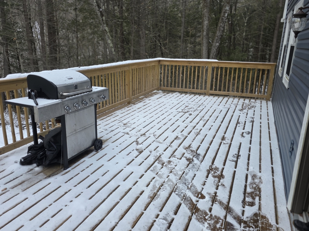 71 George Lamb Road Leyden, MA 01337 - Photo 16 of 18 a balcony with a bench