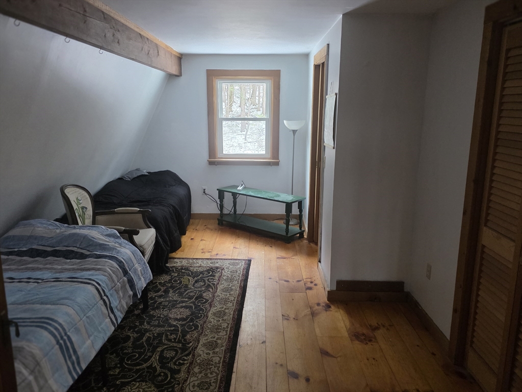 71 George Lamb Road Leyden, MA 01337 - Photo 8 of 18 a bedroom with a bed and a window