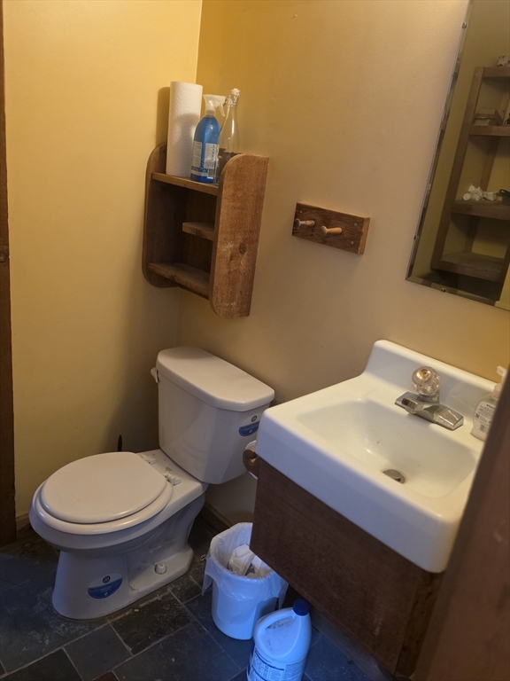 71 George Lamb Road Leyden, MA 01337 - Photo 10 of 18 a bathroom with a sink toilet and mirror