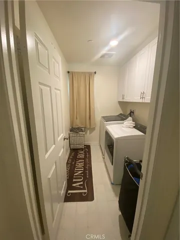 a view of a hallway with workspace