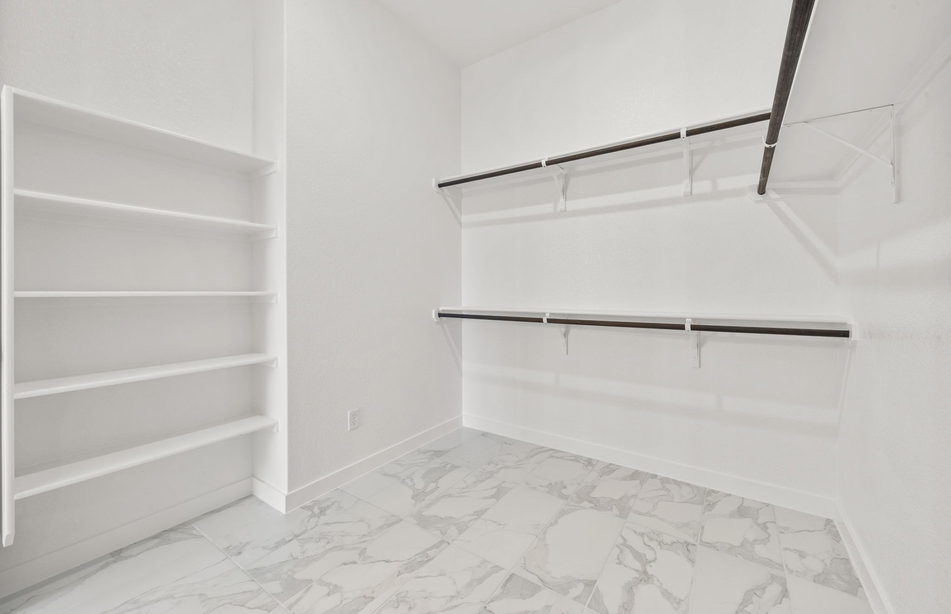 329 Muddy Creek Way Kyle, TX 78640 - Photo 12 of 22 a view of an empty walk in closet