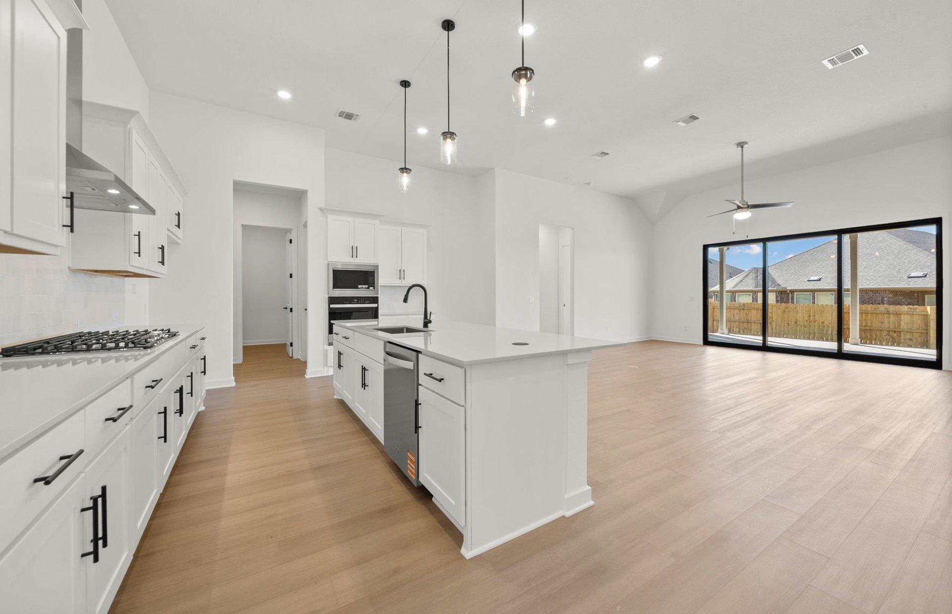 329 Muddy Creek Way Kyle, TX 78640 - Photo 5 of 22 a large kitchen with stainless steel appliances lots of counter top space