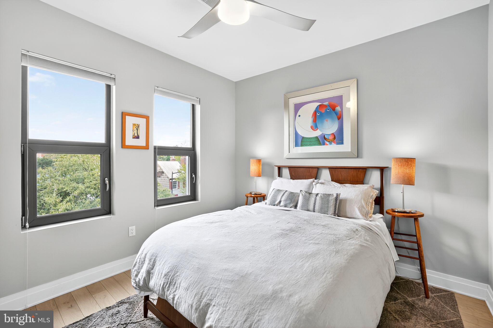 900 11th Street Southeast, Unit 308 Washington, DC 20003 - Photo 12 of 36 a bedroom with bed and window