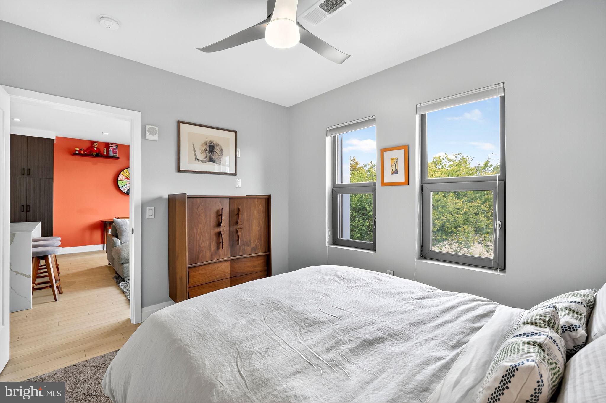 900 11th Street Southeast, Unit 308 Washington, DC 20003 - Photo 13 of 36 a bedroom with a bed and a window