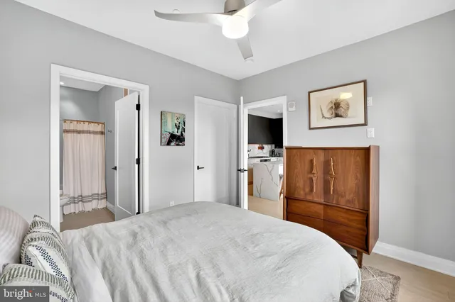 a bedroom with bed and window