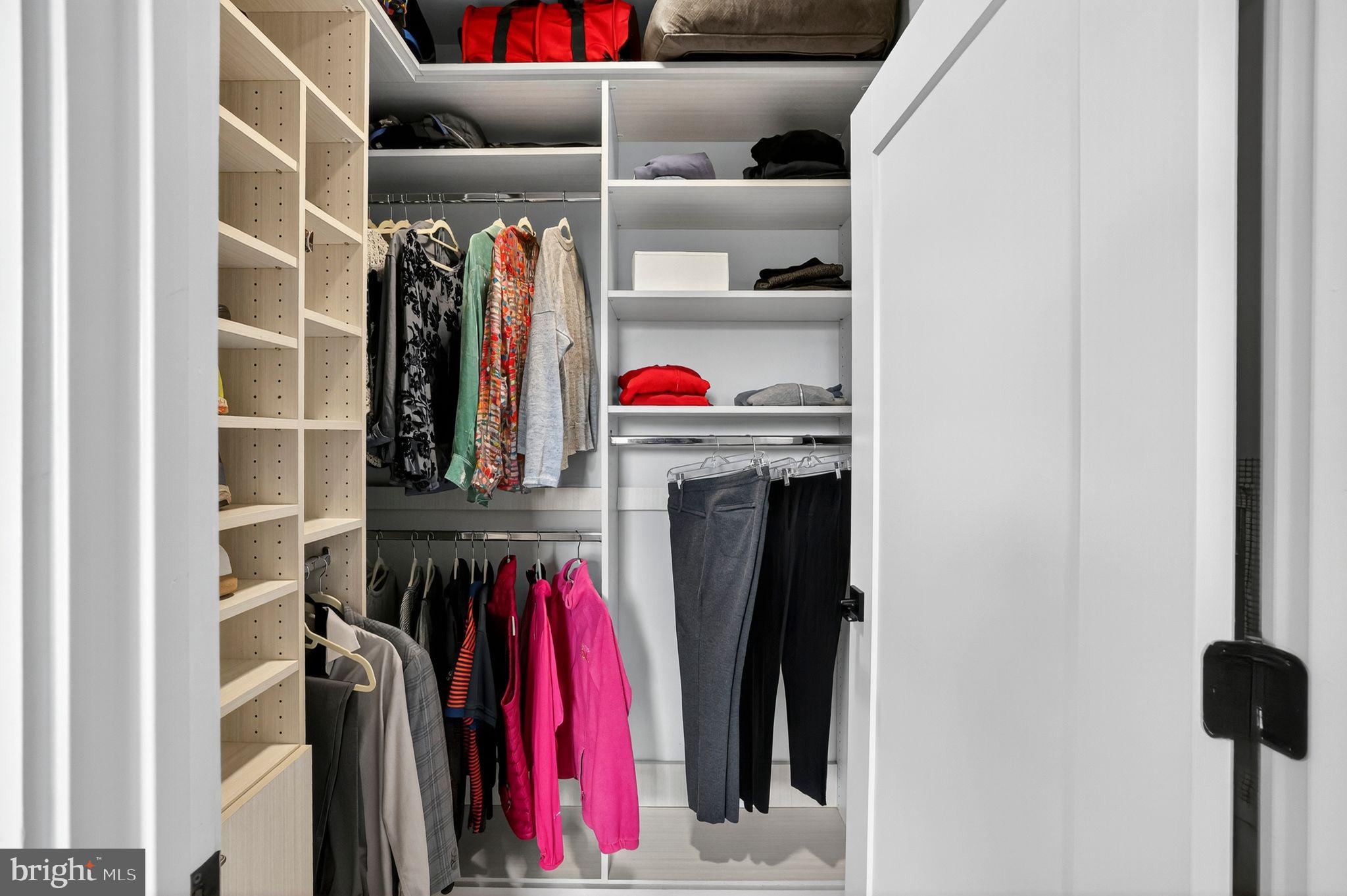 900 11th Street Southeast, Unit 308 Washington, DC 20003 - Photo 17 of 36 a view of walk in closet with clothes